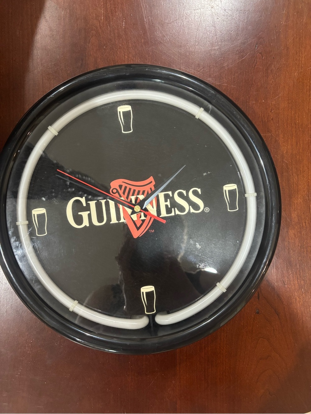 Guinness Black Wall Clock with Red Harp and Cream Accents